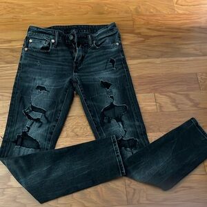 American Eagles skinny black ripped jeans.